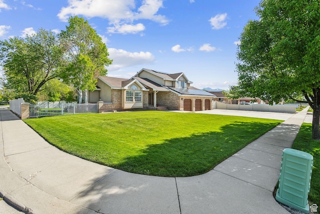 view of front of property with concrete driveway, an attached garage, brick siding, and stone siding