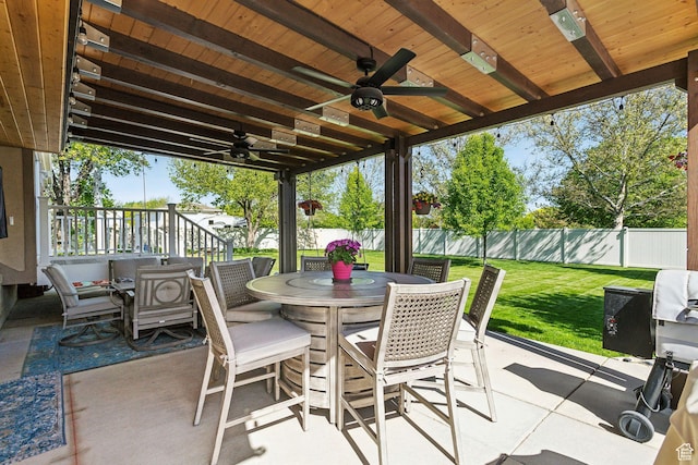 view of patio / terrace featuring ceiling fan and outdoor dining space