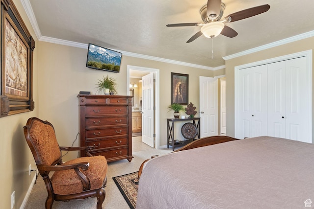bedroom with baseboards, light colored carpet, crown molding, a closet, and ceiling fan