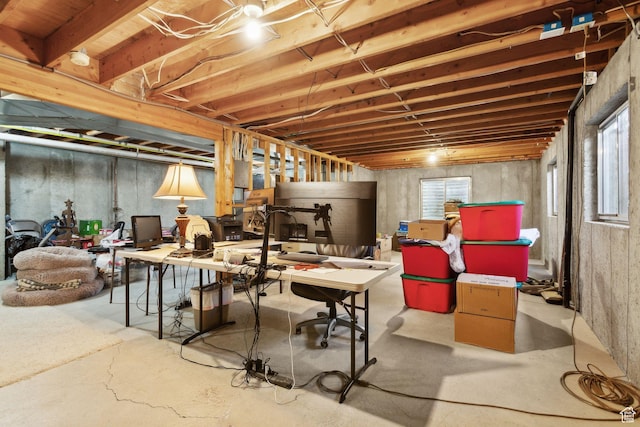 basement featuring an office area and healthy amount of natural light