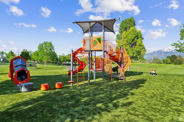 community play area with a lawn