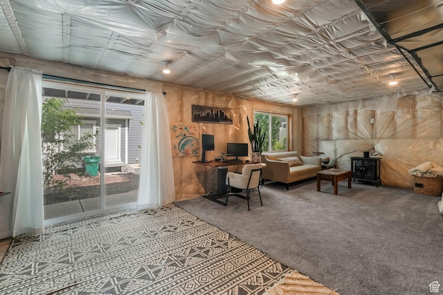 15378 S Skyraider Ln, Bluffdale, UT 84065 - carpeted office featuring a wood stove