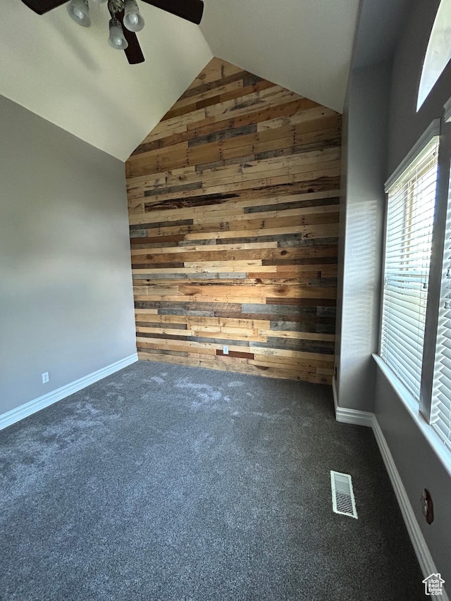 642 W 1250 S, Lehi, UT 84043 - carpeted spare room with wood walls, lofted ceiling, a ceiling fan, and baseboards