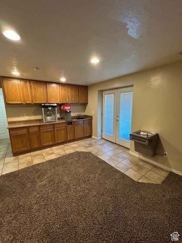 642 W 1250 S, Lehi, UT 84043 - kitchen with light tile patterned flooring, french doors, a sink, recessed lighting, and brown cabinets