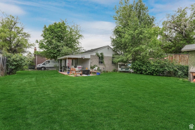 view of yard featuring a patio