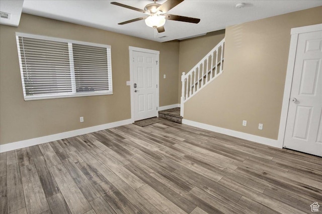 2421 N 400 E Unit M-1, North Ogden, UT 84414 - entrance foyer featuring ceiling fan, stairs, wood finished floors, and baseboards