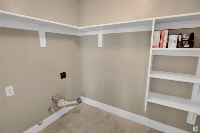 2421 N 400 E Unit M-1, North Ogden, UT 84414 - laundry room featuring hookup for an electric dryer, hookup for a gas dryer, and baseboards