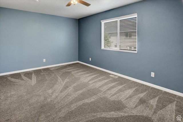 2421 N 400 E Unit M-1, North Ogden, UT 84414 - empty room featuring a ceiling fan, carpet floors, and baseboards