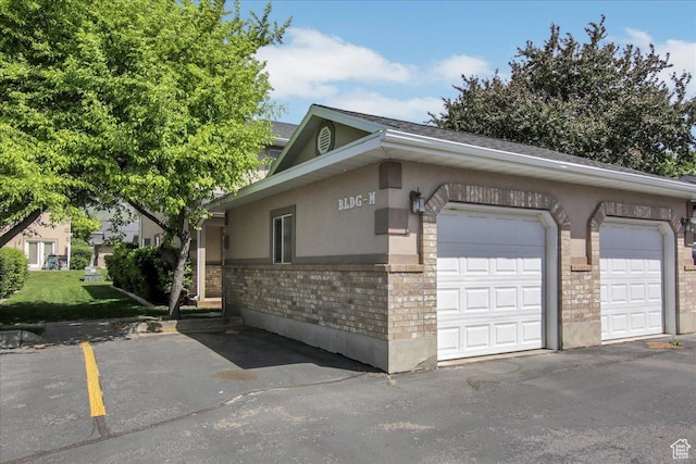 2421 N 400 E Unit M-1, North Ogden, UT 84414 - view of side of home featuring brick siding