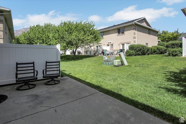 2421 N 400 E Unit M-1, North Ogden, UT 84414 - view of green lawn featuring a patio area