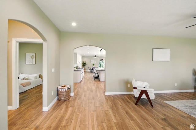2897 W 3400 N, Benson, UT 84335 - hall with arched walkways, light wood-style flooring, baseboards, and recessed lighting