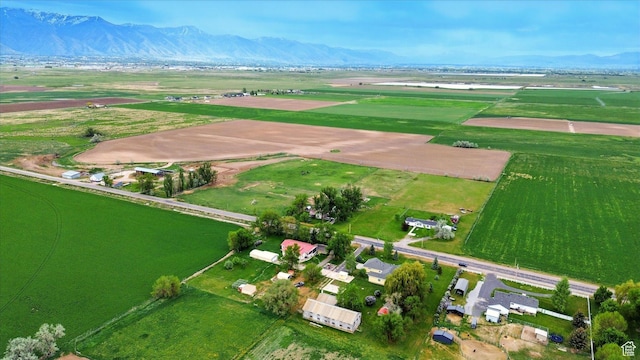2897 W 3400 N, Benson, UT 84335 - aerial view of property's location featuring rural landscape, large plots for crops, and mountains