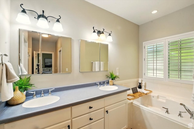 2897 W 3400 N, Benson, UT 84335 - full bathroom with a garden tub and double vanity