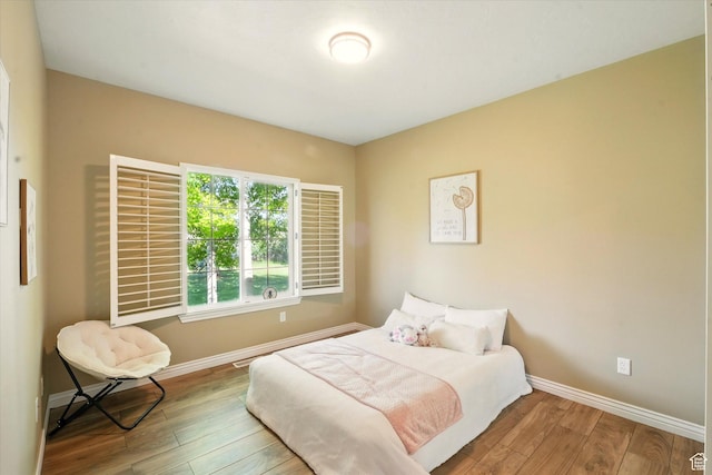 2897 W 3400 N, Benson, UT 84335 - bedroom with wood-type flooring and baseboards