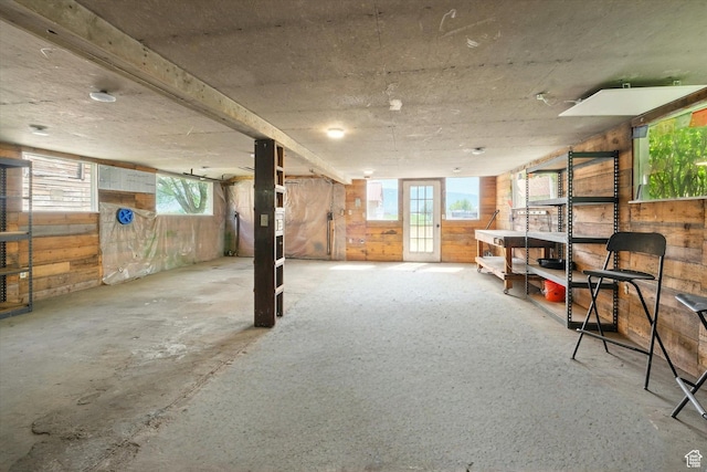 2897 W 3400 N, Benson, UT 84335 - basement featuring wood walls and healthy amount of natural light
