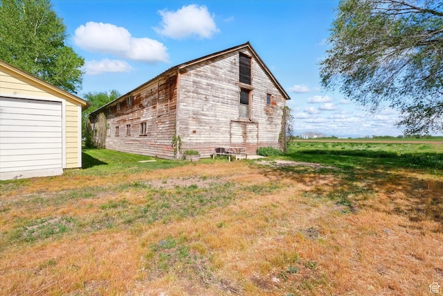 2897 W 3400 N, Benson, UT 84335 - view of property exterior featuring a yard
