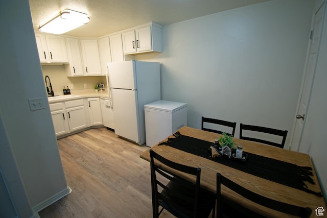 1456 S 430 W, Orem, UT 84058 - kitchen featuring freestanding refrigerator, white refrigerator, a sink, and light wood-style flooring