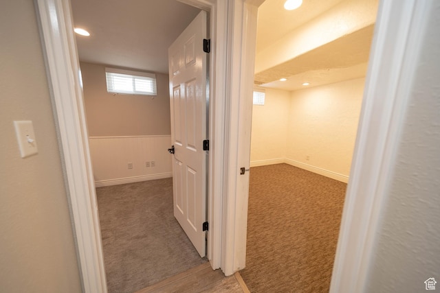 hall featuring carpet floors, recessed lighting, and baseboards