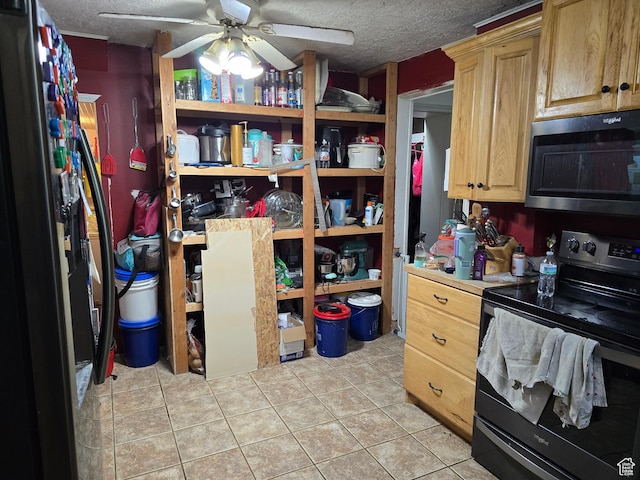 storage room with a ceiling fan