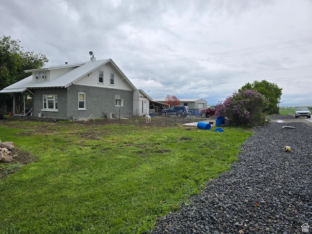 view of property exterior with stucco siding and cooling unit