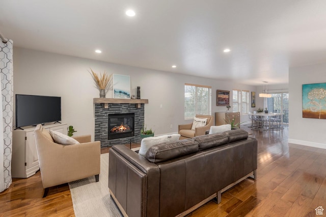 1267 E Foxcrest Ct, Park City, UT 84098 - living room with wood finished floors, recessed lighting, a fireplace, and baseboards