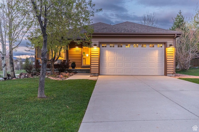 1267 E Foxcrest Ct, Park City, UT 84098 - ranch-style house featuring driveway, a yard, a garage, and roof with shingles