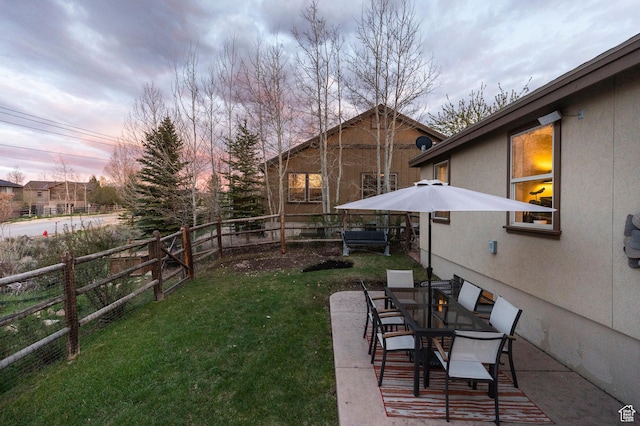 1267 E Foxcrest Ct, Park City, UT 84098 - yard at dusk with a patio area
