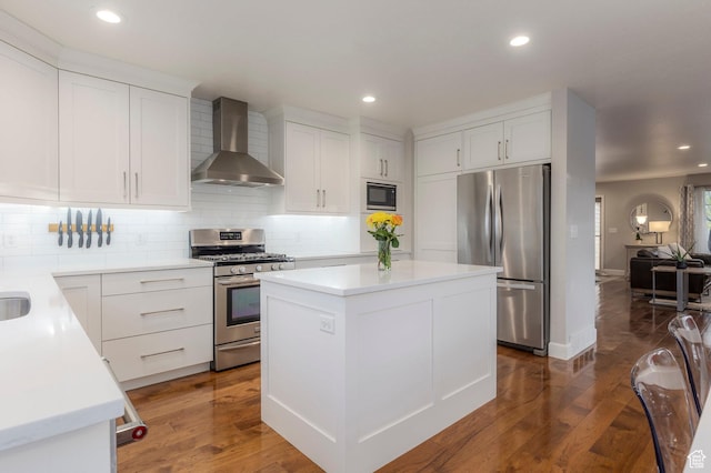 1267 E Foxcrest Ct, Park City, UT 84098 - kitchen with wall chimney range hood, appliances with stainless steel finishes, backsplash, dark wood-type flooring, and recessed lighting