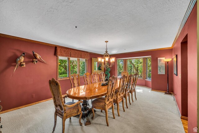305 S Rachel Ln, New Harmony, UT 84757 - dining room with light colored carpet, ornamental molding, a chandelier, baseboards, and a textured ceiling
