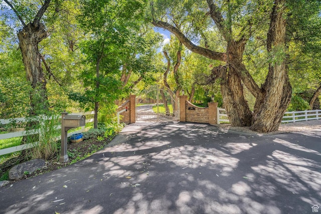 305 S Rachel Ln, New Harmony, UT 84757 - view of property's community with a gate and fence