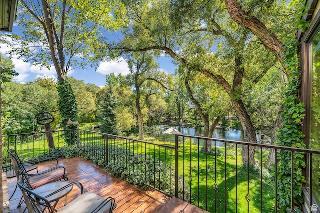 305 S Rachel Ln, New Harmony, UT 84757 - wooden terrace featuring a water view and view of wooded area