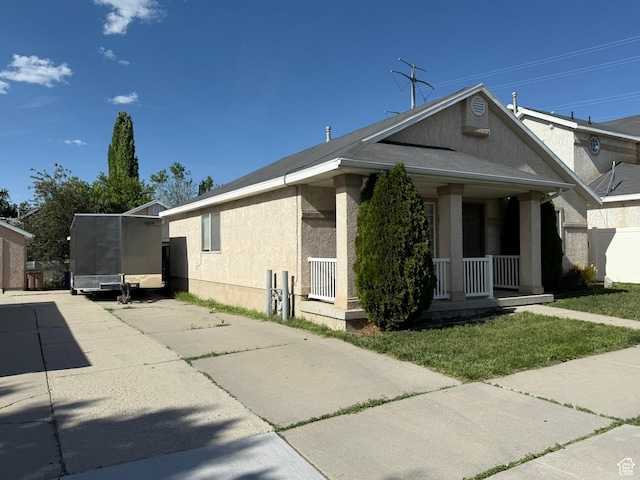 246 W Inauguration Rd S, Draper, UT 84020 - view of home's exterior featuring covered porch and stucco siding