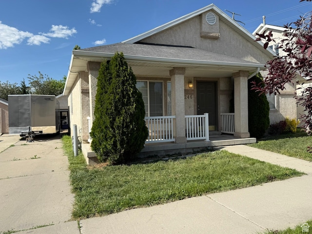 246 W Inauguration Rd S, Draper, UT 84020 - bungalow-style home featuring covered porch, stucco siding, a front yard, and concrete driveway
