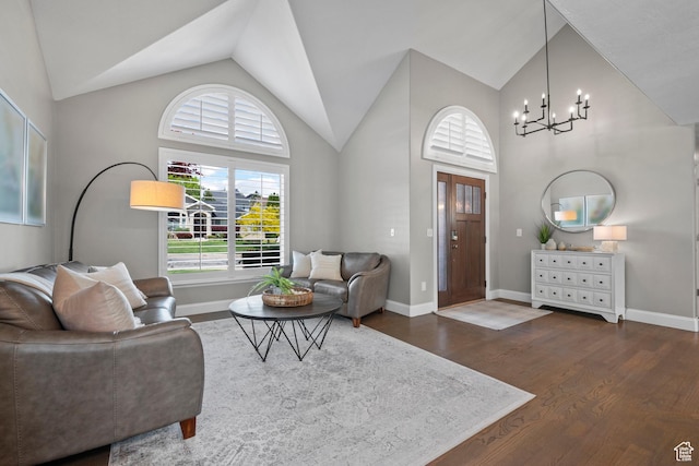 2242 E Deere View Dr N, Layton, UT 84040 - living room with a chandelier, dark wood-style floors, baseboards, and high vaulted ceiling
