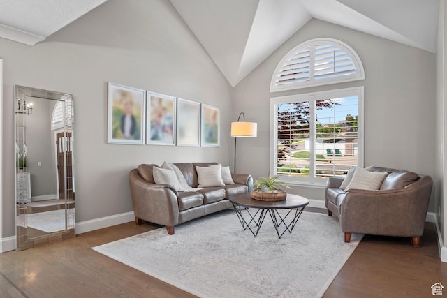 2242 E Deere View Dr N, Layton, UT 84040 - living room featuring wood finished floors, vaulted ceiling, and baseboards