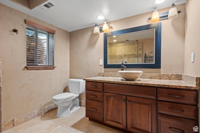 2242 E Deere View Dr N, Layton, UT 84040 - bathroom featuring a shower, baseboards, toilet, vanity, and tile patterned flooring