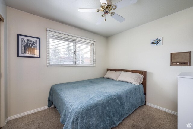 125 E Countryside Cir, Park City, UT 84098 - carpeted bedroom with baseboards and a ceiling fan