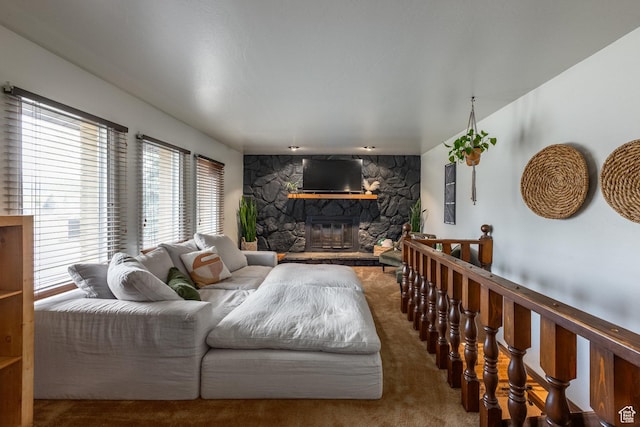 125 E Countryside Cir, Park City, UT 84098 - living room with healthy amount of natural light, a stone fireplace, and carpet floors
