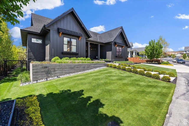 modern farmhouse with board and batten siding and a shingled roof