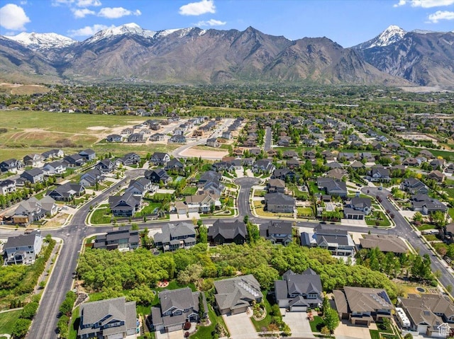 aerial overview of property's location featuring nearby suburban area and mountains