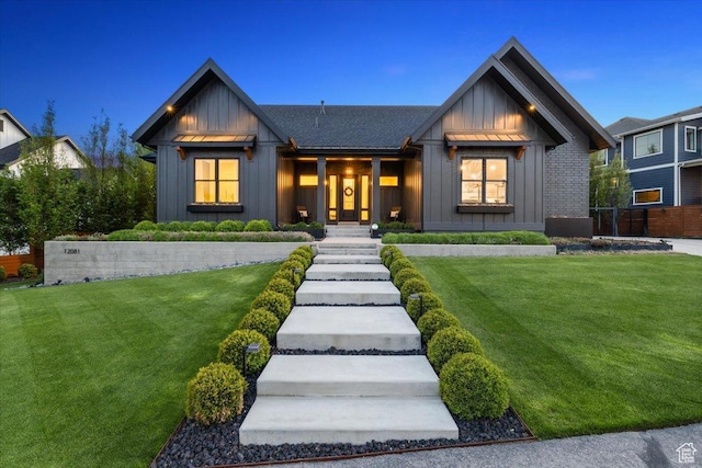 modern farmhouse featuring board and batten siding and roof with shingles