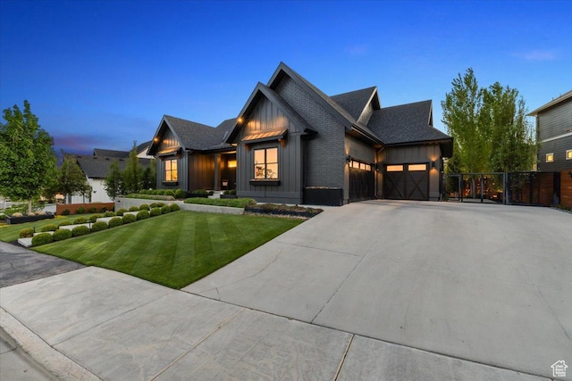 view of front of home featuring board and batten siding, an attached garage, driveway, and roof with shingles