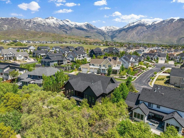 aerial view of residential area with a mountain backdrop