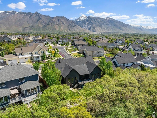 aerial view of residential area with a mountain backdrop