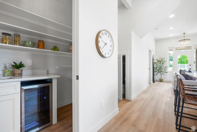 3670 S 1300 E, Millcreek, UT 84106 - indoor dry bar with beverage cooler, light wood-style flooring, baseboards, and recessed lighting