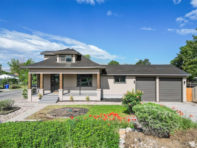 3670 S 1300 E, Millcreek, UT 84106 - view of front of house featuring an attached garage, a porch, and driveway
