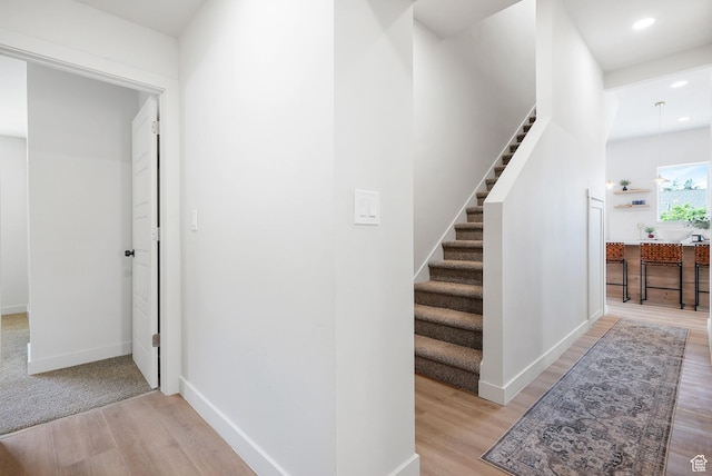 3670 S 1300 E, Millcreek, UT 84106 - stairs featuring wood finished floors, recessed lighting, and baseboards