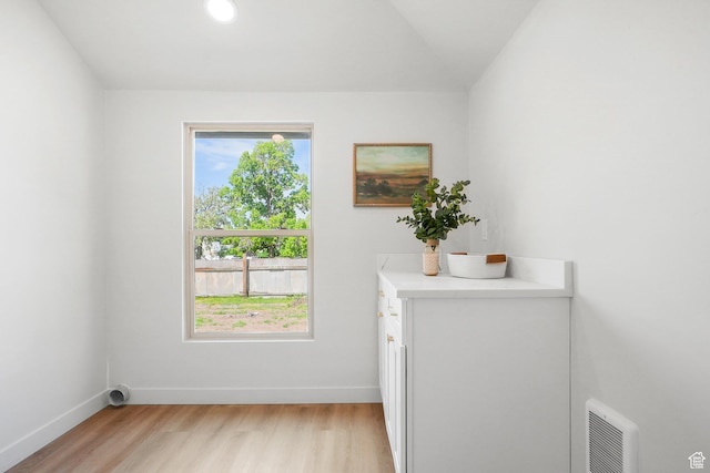 3670 S 1300 E, Millcreek, UT 84106 - laundry room with light wood-style flooring and baseboards