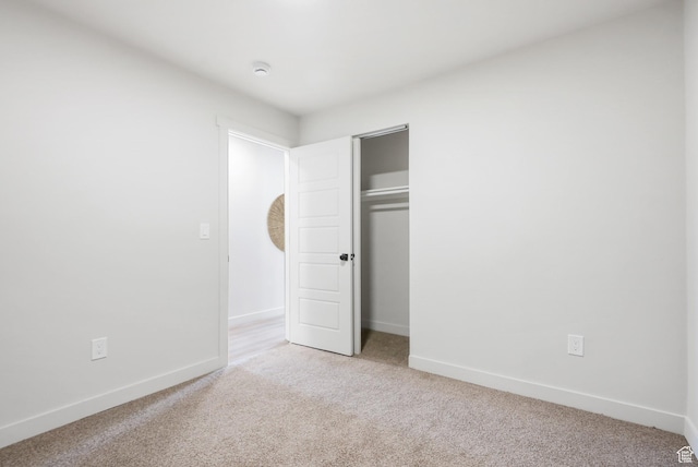 3670 S 1300 E, Millcreek, UT 84106 - unfurnished bedroom with light colored carpet, baseboards, and a closet