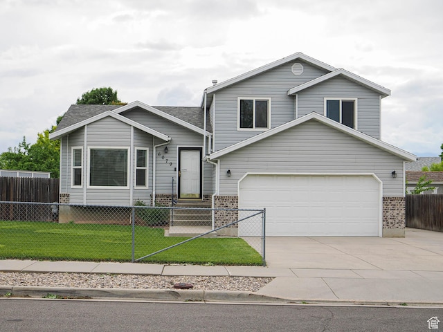 view of front facade with concrete driveway, brick siding, and an attached garage